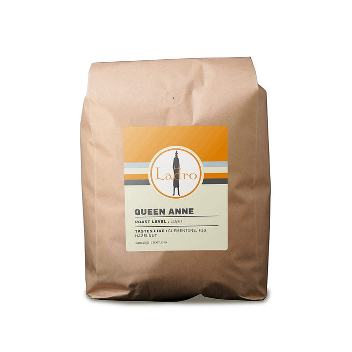Queen Anne coffee bag with orange top and cream label showing Ladro logo and branding