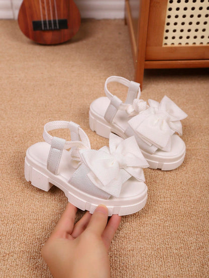 1 Pair New Summer Fashion High Heel Sandals, Designed For Girls, With Soft And Thick Soles, Decorated With Bow Tie. Lace-Up Design To Prevent Slipping Off. Suitable For Princesses Aged 3-15 To Wear On