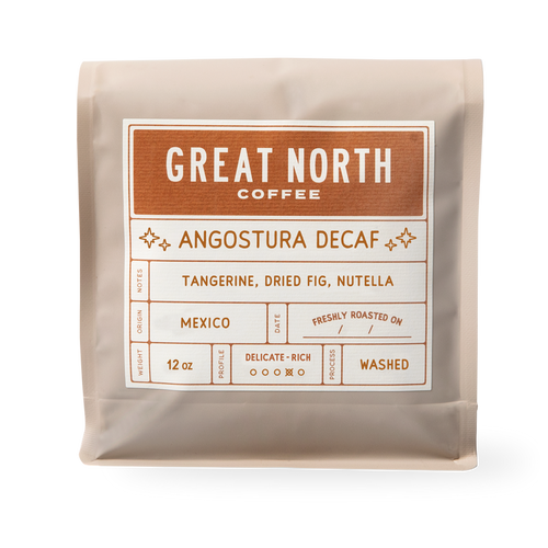 Great North Coffee Angostura Decaf bag label showing Chiapas Mexico origin and tasting notes Tangerine Dried Fig Nutella