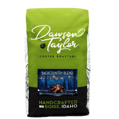 Green Dawson Taylor Backcountry Blend coffee bag with mountain label and Boise Idaho branding