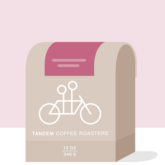 Burundi Munkaze coffee bag beige with white bicycle graphic from Tandem Coffee Roasters.
