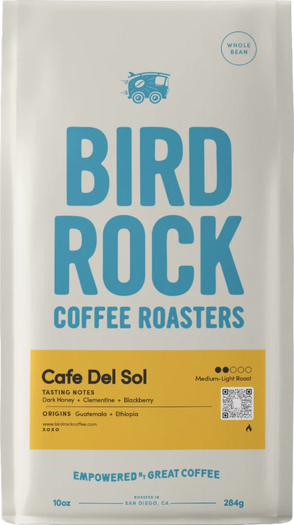 Cafe Del Sol coffee bag by Bird Rock Coffee Roasters with bold blue logo and yellow tasting notes panel