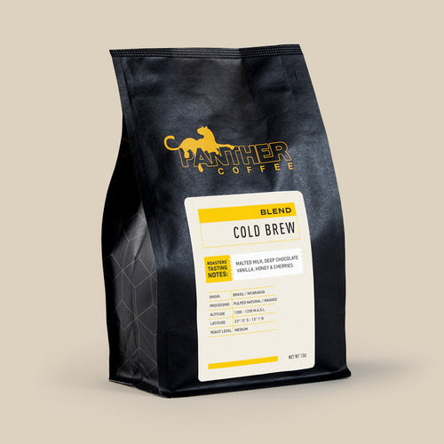 Panther Coffee Cold Brew blend bag featuring a yellow Panther logo and white label