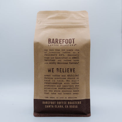Colombia Tolima coffee bag from Barefoot Coffee Roasters displayed against a pale blue background