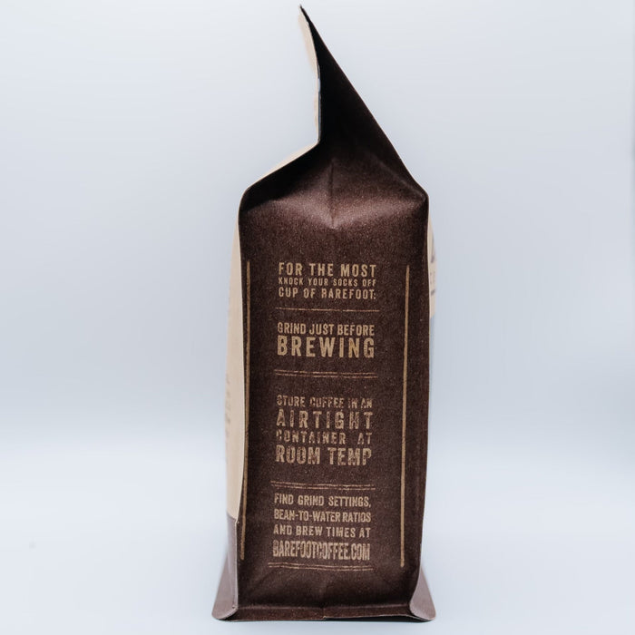Close up of a brown Barefoot Coffee Roasters bag featuring Tolima Colombia label.