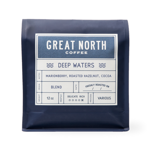 Deep Waters bag from Great North Coffee in navy packaging with the Deep Waters label and marionberry roasted hazelnut cocoa notes