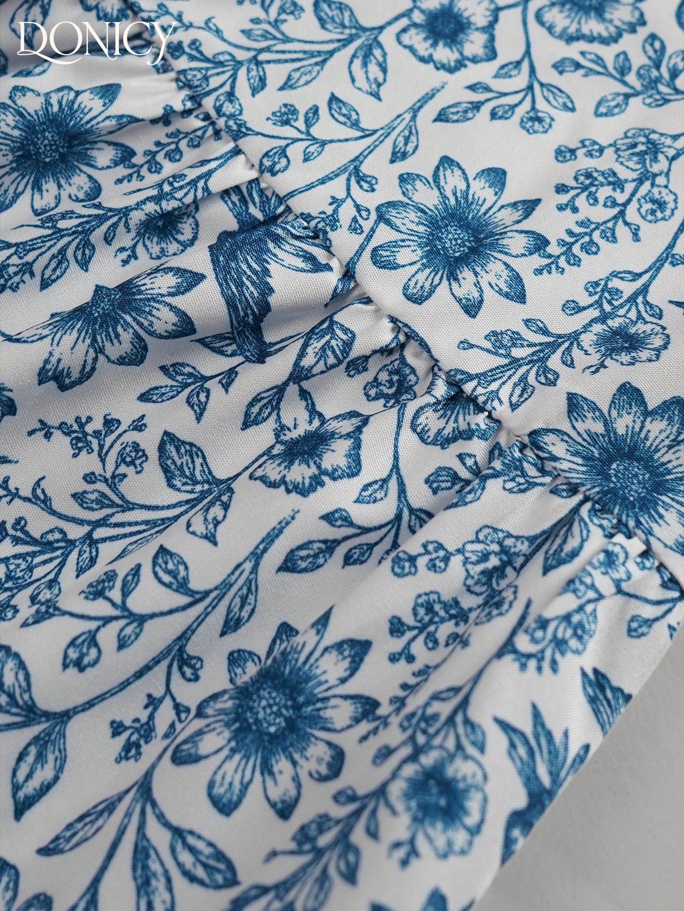 DONICY Women's Elegant Blue Floral Sleeveless Midi Dress- Round Neck Design, Layered A-Line Cut, Flowing Hem, Lightweight Breathable Fabric