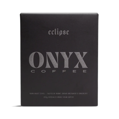 Dark Eclipse Onyx coffee box with the word eclipse in gothic type and a prominent ONYX logo.
