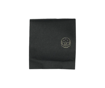 Onyx Eclipse dark roast coffee bag with a gold skull logo on black packaging