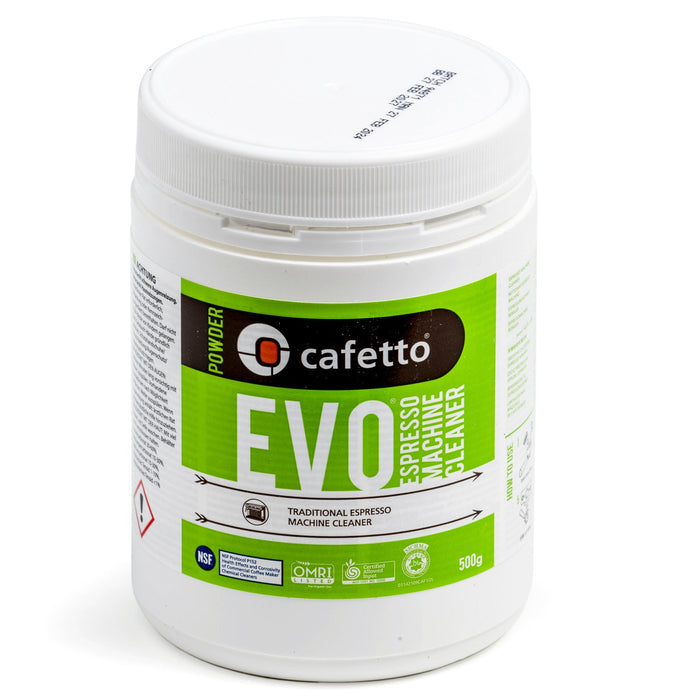 White EVO Espresso Machine Cleaner bottle with green label and safety icons