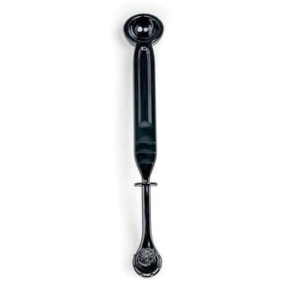 Black steam wand cleaning brush with round bristled head