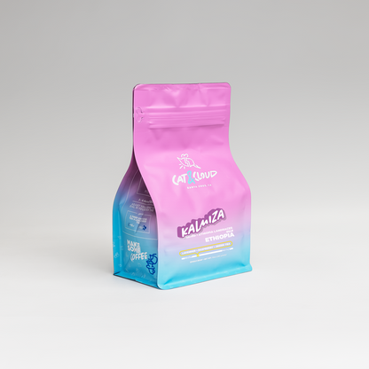 Ethiopia Kalmiza washed coffee bag in pink packaging with lavender accents and teal gradient at the base.