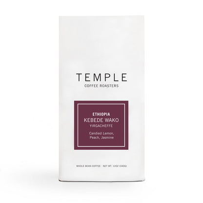 Ethiopia Kebede Wako coffee bag with burgundy label showing Ethiopia Kebede Wako and notes Candied Lemon Peach Jasmine.
