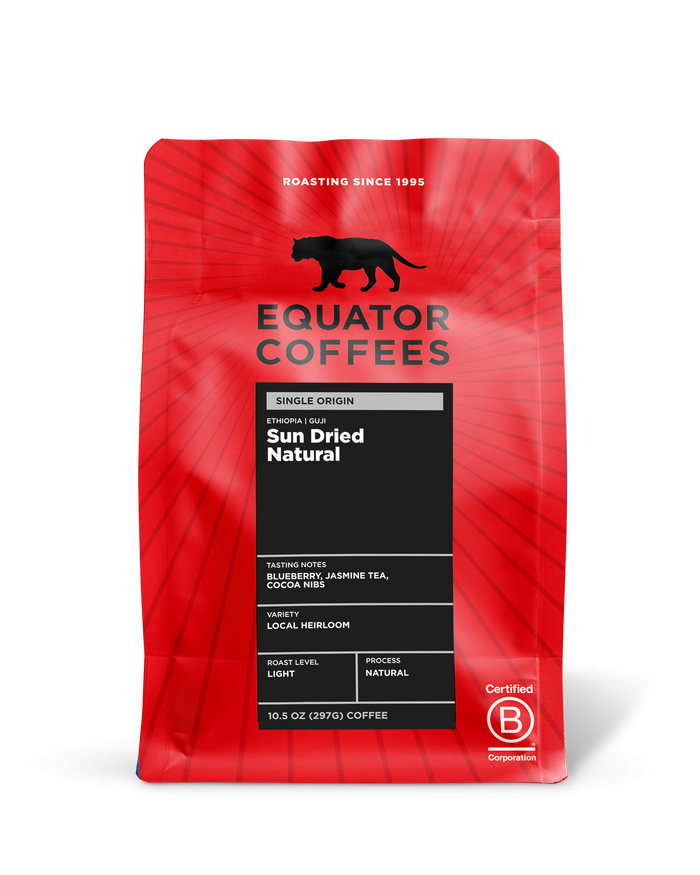 Equator Coffees red single origin bag Ethiopia Guji Sun Dried Natural with black tasting notes panel.