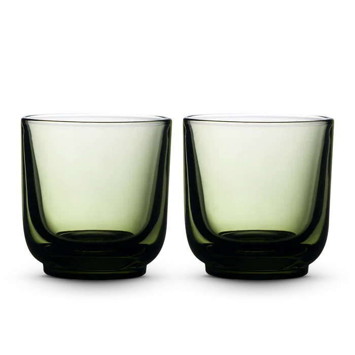 Pair of pale green Fellow Pirch espresso shot glasses side by side