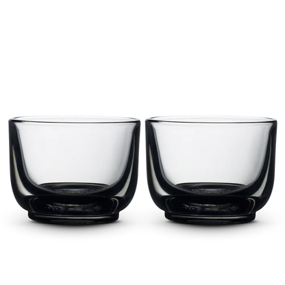 Pair of Fellow Pirch espresso shot glasses with clear bowls and dark bases