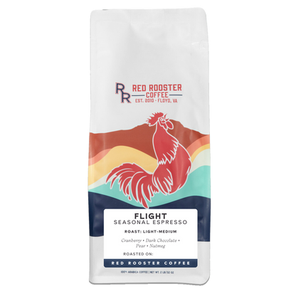 Flight Seasonal Espresso bag showing rooster artwork against a multicolor background and roast details.