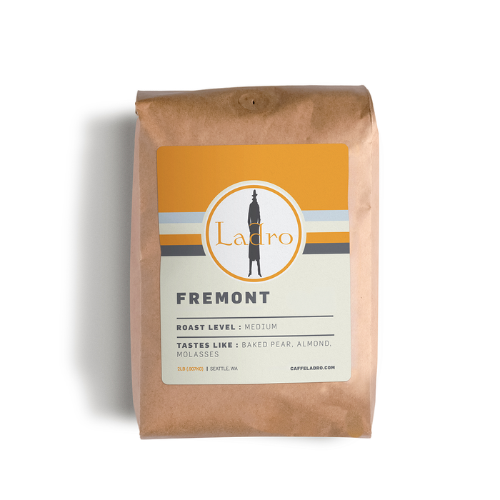 Fremont coffee bag from Ladro with a white circular logo on an orange label