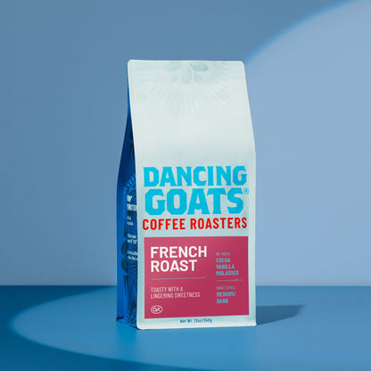 Dancing Goats French Roast coffee bag with pink panel and bold white text advertising tasting notes and roast level.