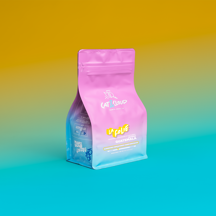Guatemala La Folie coffee bag in pink packaging against a warm golden gradient background