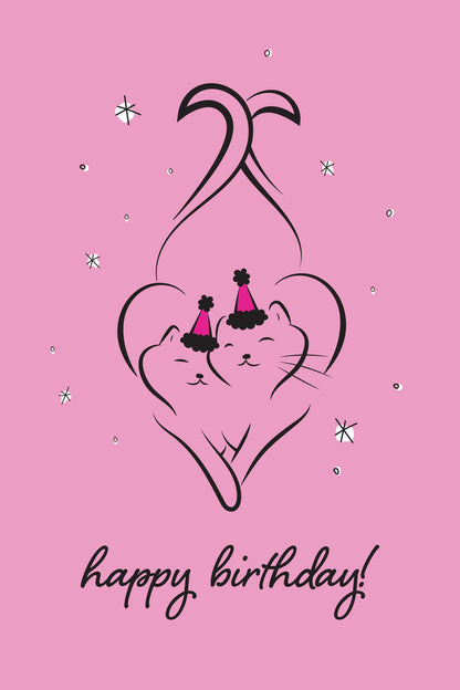 Happy birthday card with two cats in party hats inside a heart on a pink background.