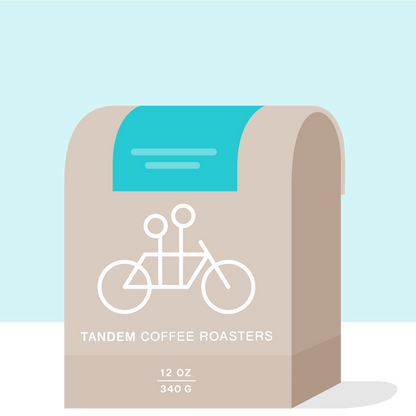 La Piramide Colombia packaging with turquoise backdrop beige curves and Tandem branding