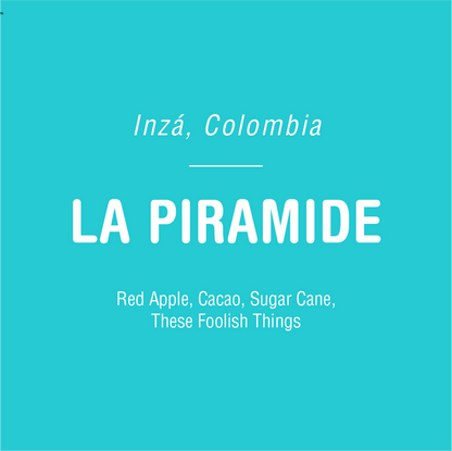 La Piramide coffee package on turquoise background with large LA PIRAMIDE text and origin notes