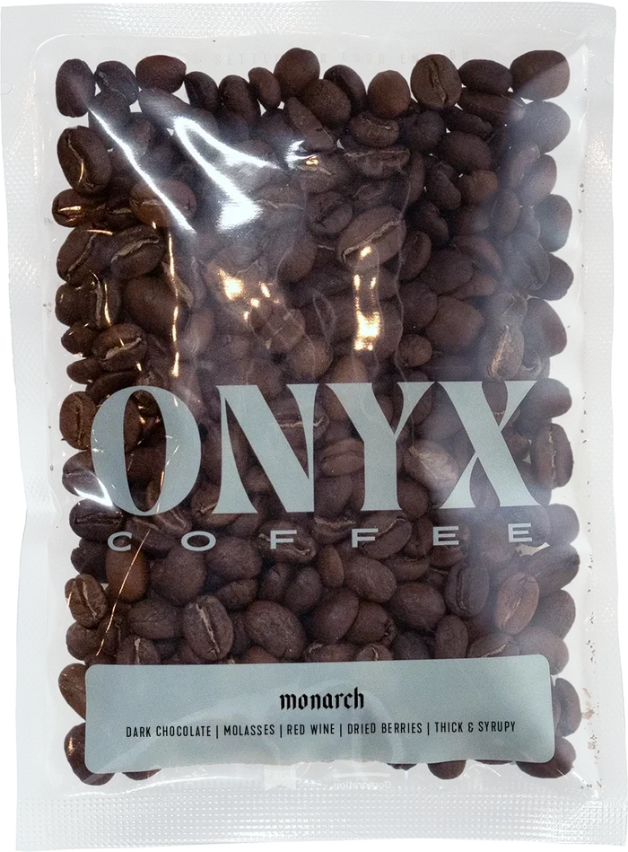 Monarch coffee beans in a clear bag with bold ONYX logo across the front