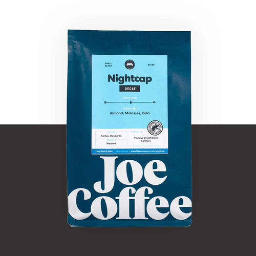 Nightcap Decaf coffee bag with blue label and bold Joe Coffee typography