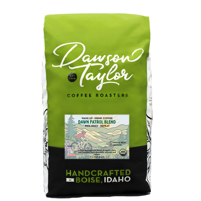 Green Dawn Patrol coffee bag with white Dawson Taylor script logo and Boise Idaho handcrafted label