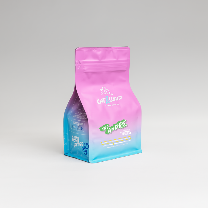 Peru The Andes Washed coffee bag in pink against a light gray gradient background.