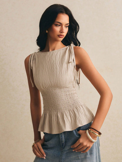 Poéselle Women's Smocked Peplum Tank Top For Women – Sleeveless Tie Shoulder Top, Casual French Elegant Summer Textured Smocked Tank Top Brunch Beige