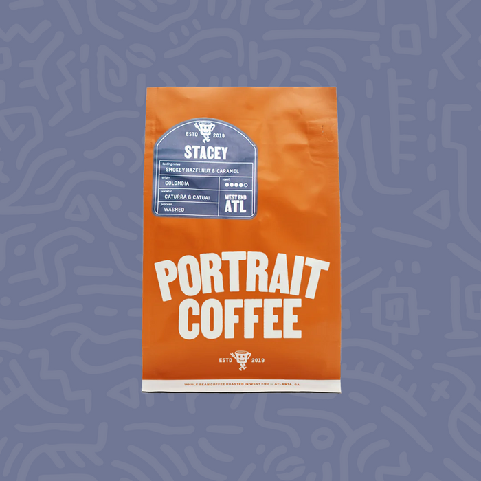 Orange Stacey coffee bag from Portrait Coffee featuring a blue Stacey label and Colombia origin.