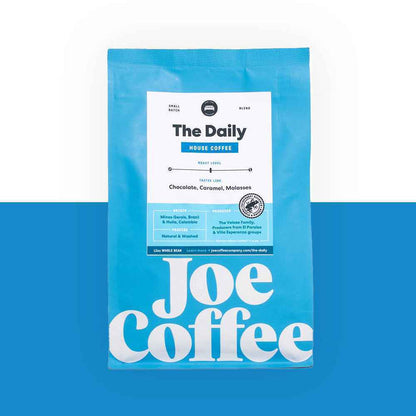 Bright blue The Daily coffee bag with white label and Joe Coffee branding