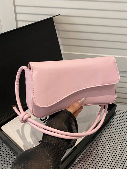 This Fashionable And Minimalist Bag Features An Asymmetrical Flap And Adjustable Shoulder Strap, Suitable For Shopping And Carrying A Wallet