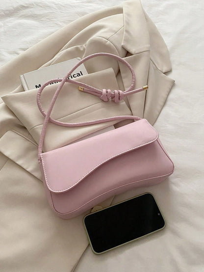 This Fashionable And Minimalist Bag Features An Asymmetrical Flap And Adjustable Shoulder Strap, Suitable For Shopping And Carrying A Wallet